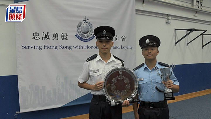 譚鈞鎧督察(左)與吳志霖警員。楊偉亨攝