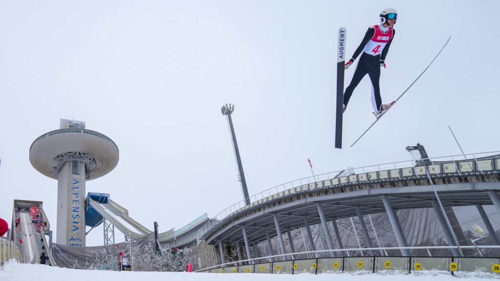 飛躍距離是跳台滑雪評分標準之一。 新華社
