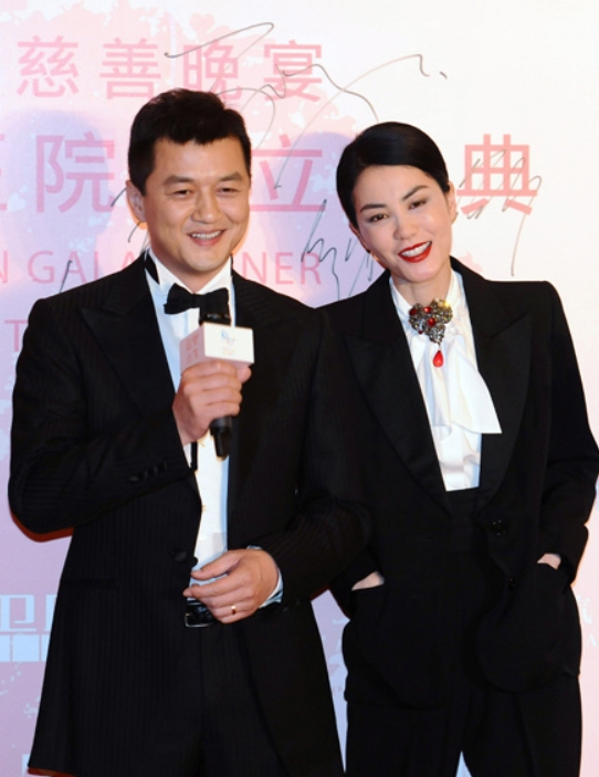 李亚鹏与王菲。 中新社资料图