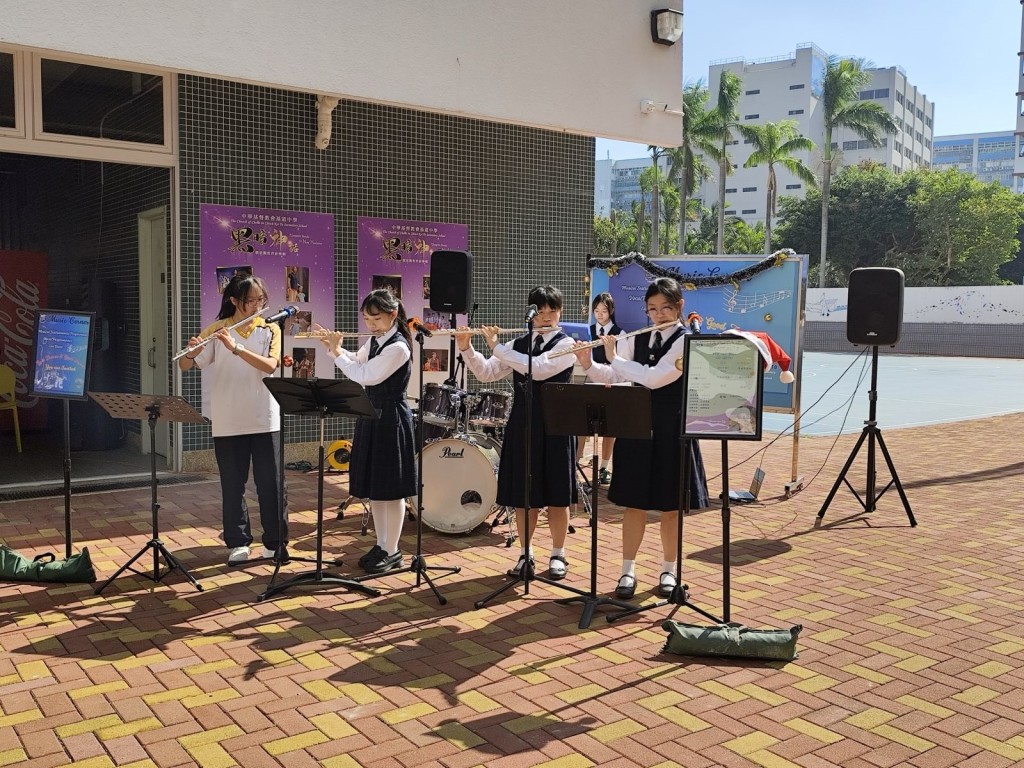 不同年級的學生演奏各式各樣的樂器，專注演出。（圖片來源：受訪學校提供）（圖片來源：受訪學校提供）