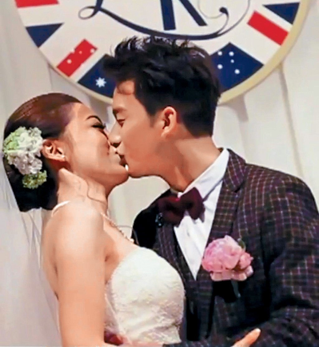 周吉佩與太太黃彥欣在2014年拉埋天窗。