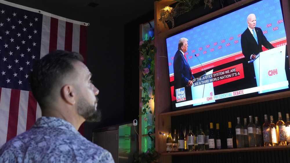 美國大選首場電視辯論，備受關注。 美聯社