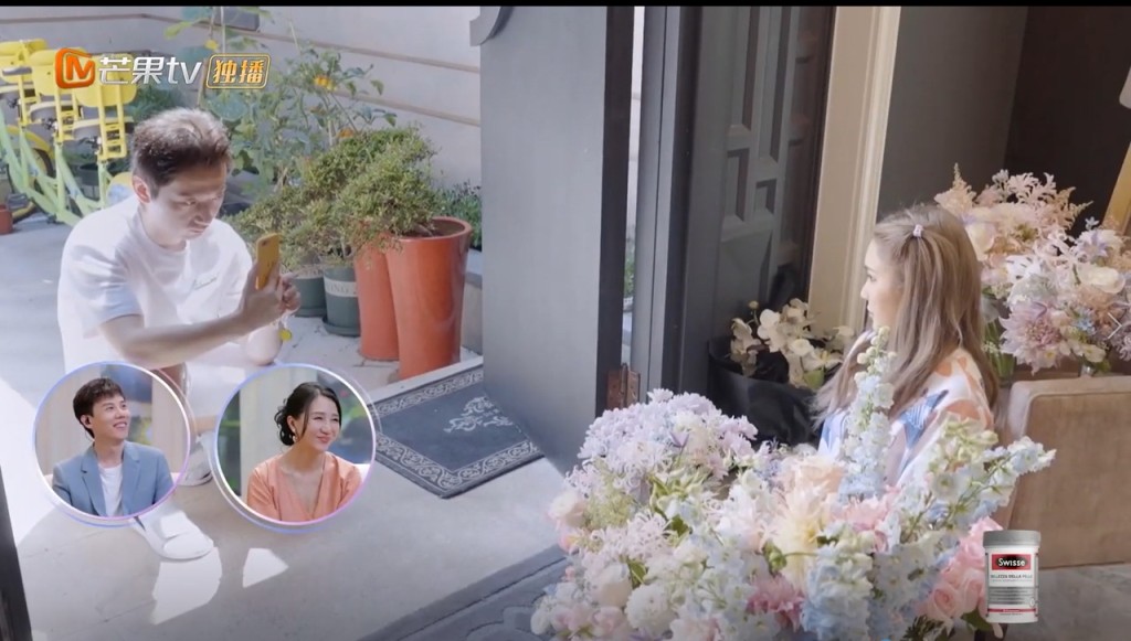 羅昊送花又充當攝影師。