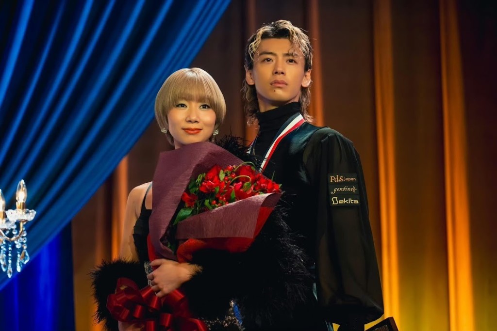 土居志央梨在片中扮演竹內的拉丁舞partner。 土居志央梨在片中扮演竹內的拉丁舞partner。