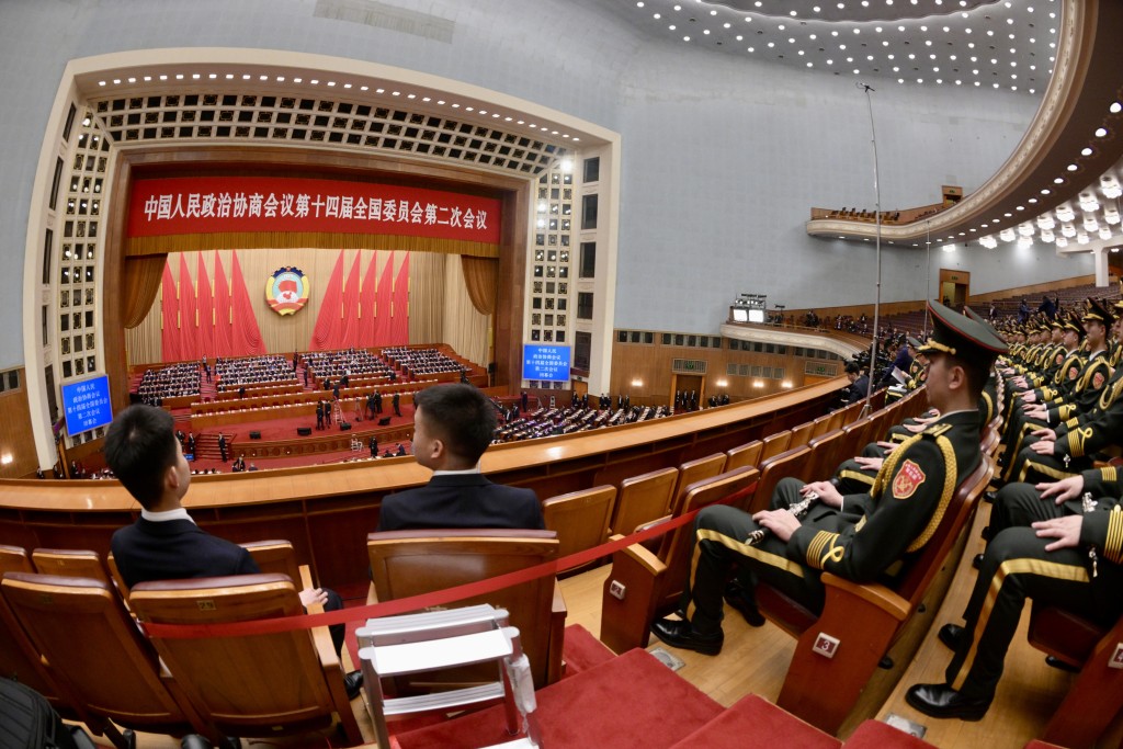 今晨全國政協十四屆二次會議在北京人民大會堂舉行閉幕會。蘇正謙攝