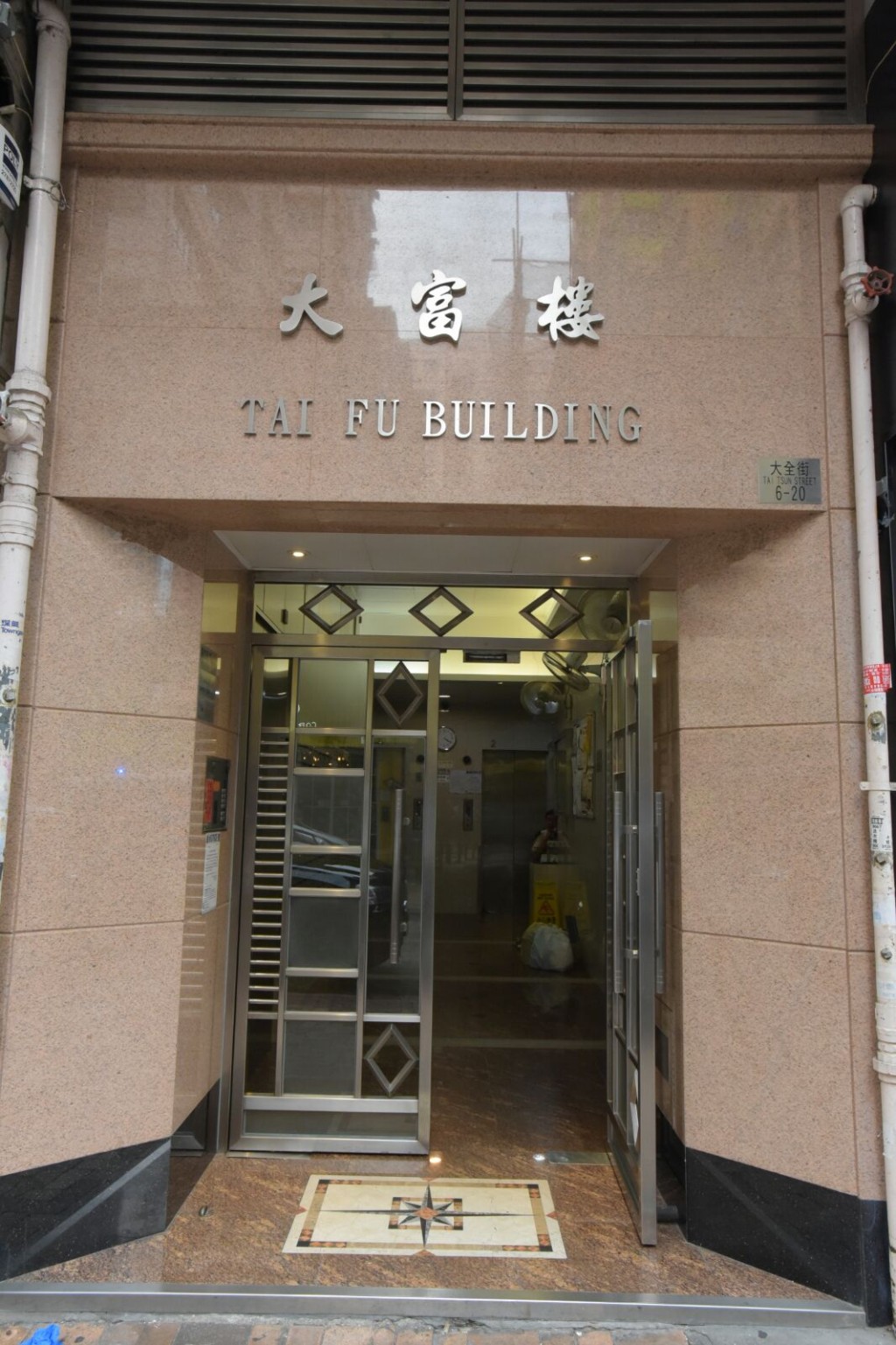 現場是大角嘴129號大同新邨大富樓。黃文威攝