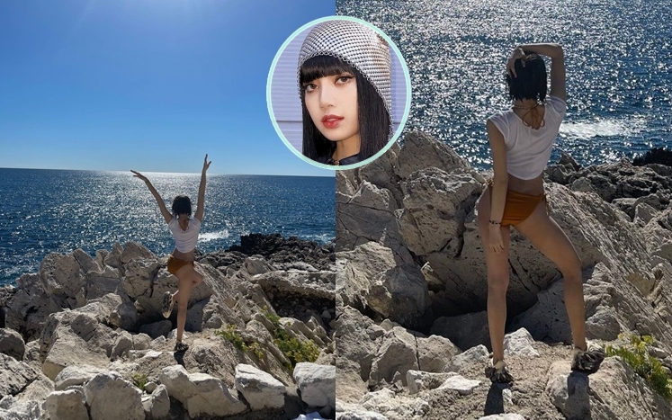 LISA分享度假相，大show長腿同靚景。