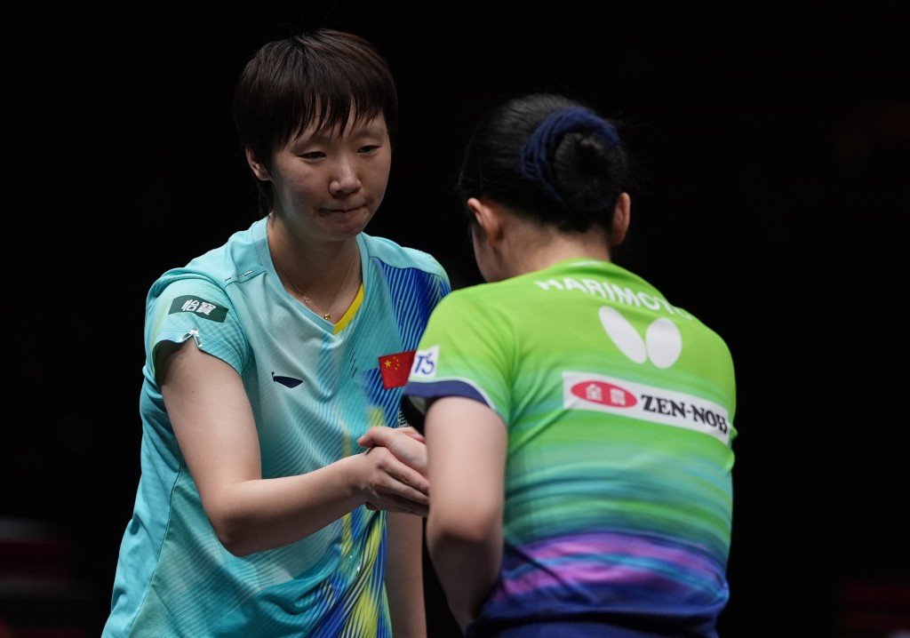 王曼昱17日內連贏張本美和5次。新華社
