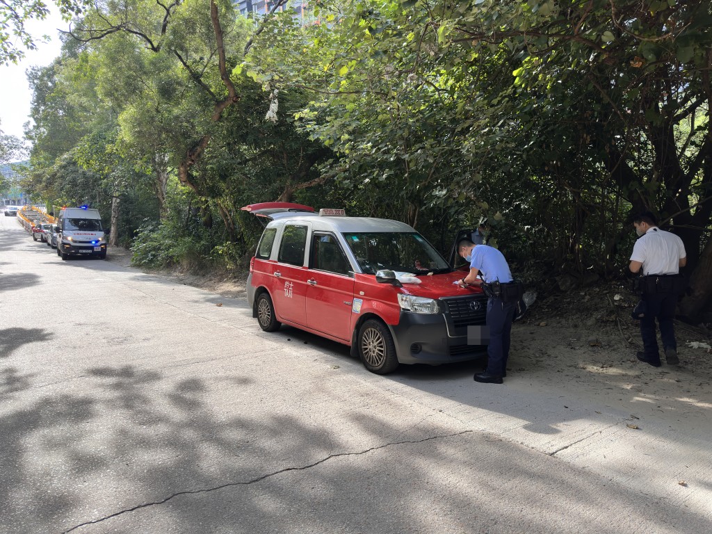 的士司機在車內燒炭身亡。梁國峰攝