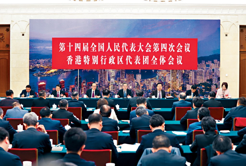 国务院副总理丁薛祥出席港区全国人大代表团全体会议。
