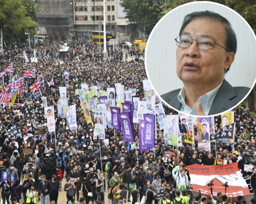 全國人大常委譚耀宗指不應利用遊行帶出其他政治目的。資料圖片