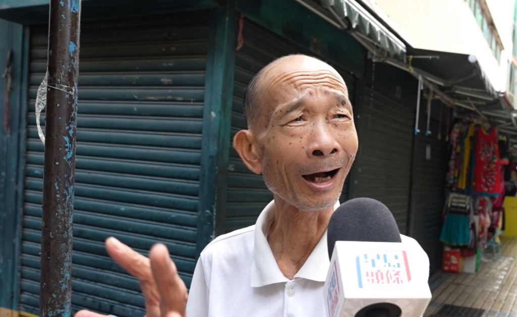 市民李先生。何君健攝