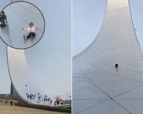 小孩爬上遼寧地標建築「生命之環」當滑梯。（影片截圖）
