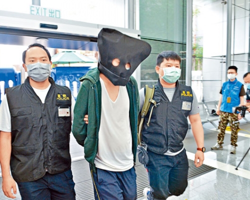 男子行兇後被警方拘捕,押返警署調查。資料圖片