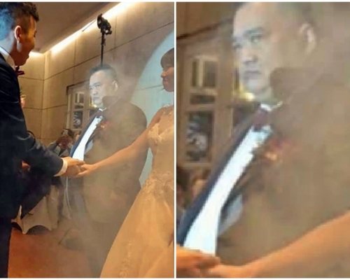 台灣一對新人幸福牽手,一旁的新娘爸爸卻被發現兇狠怒瞪新郎。網圖