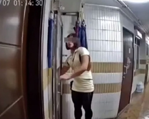 男扮女裝的疑匪,被拍下過程。網上片段截圖