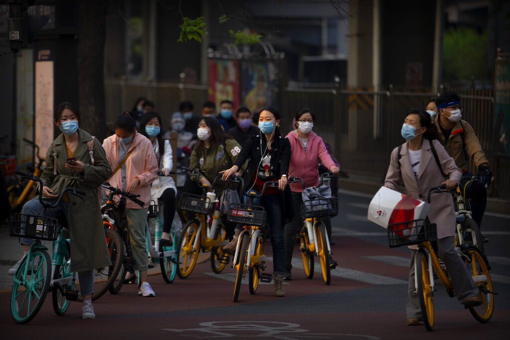 新冠肺炎在內地有緩和跡象,惟各地均仍不鬆懈。AP