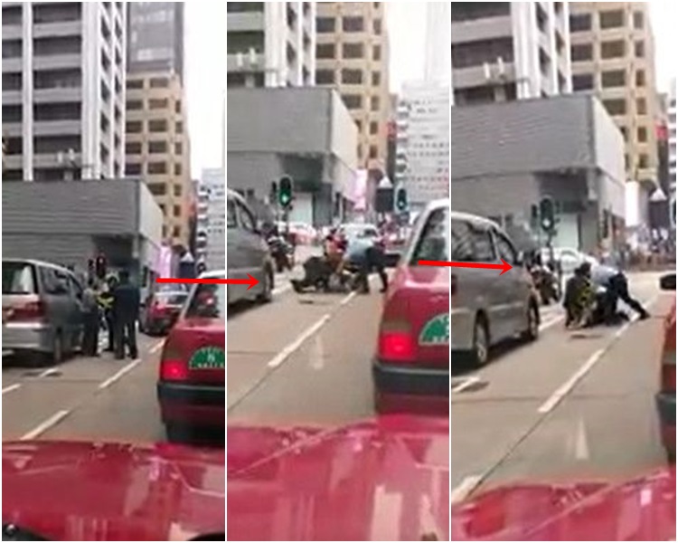 司機與數名警員理論及發生糾纏一同跌地。圖:網民Lee Fu Keung