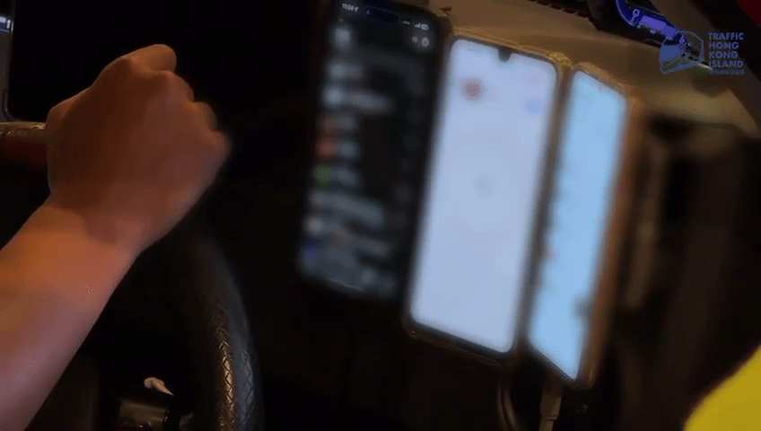 有司機涉駕駛時在前方放置多於兩部流動電訊裝置被檢控。