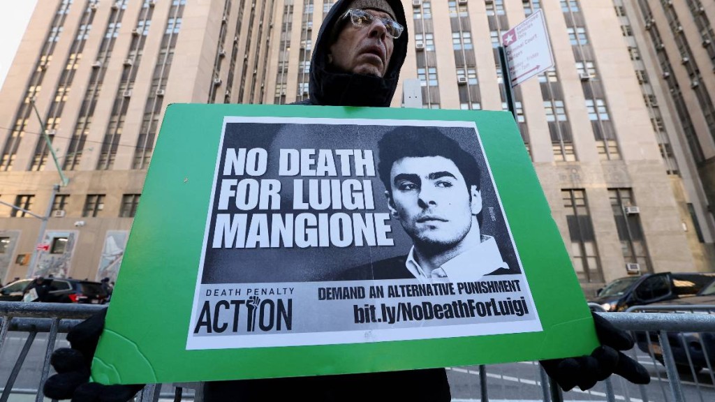 支持曼吉奧的市民  路透社