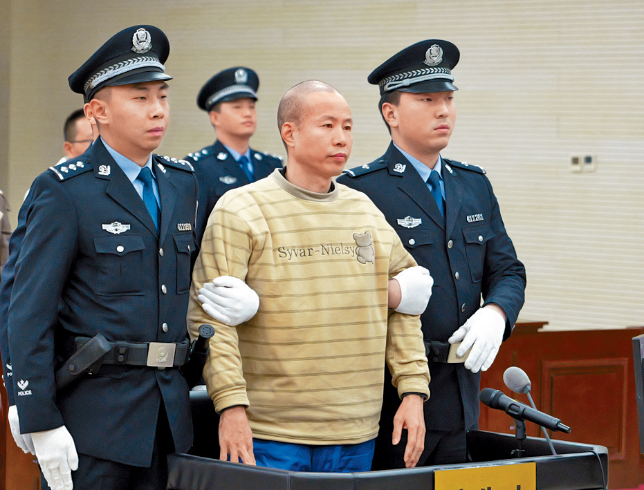 兇徒黨志軍（中）被處決。