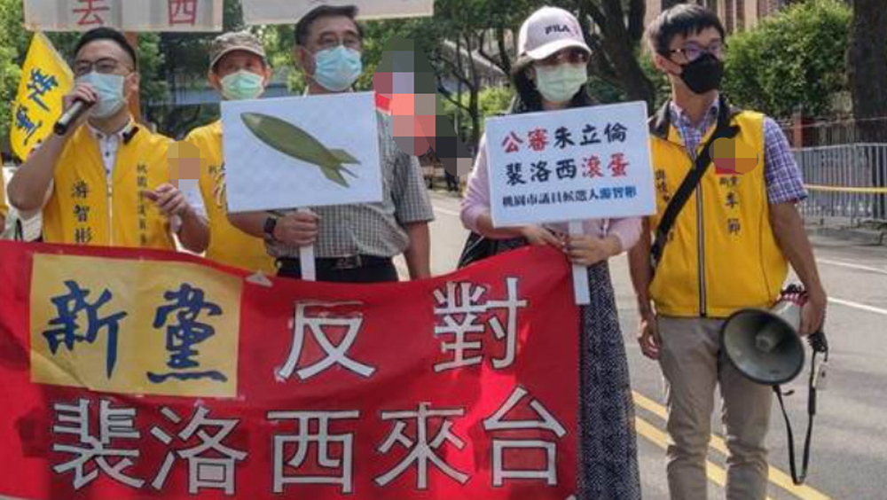台湾有团体率众抗议美国侵门踏户。网图