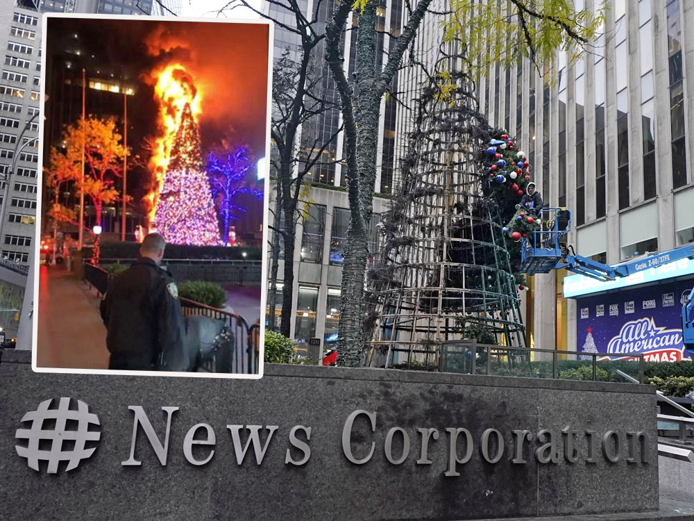 美國紐約新聞大廈外巨型聖誕樹遭人縱火。AP圖/網圖