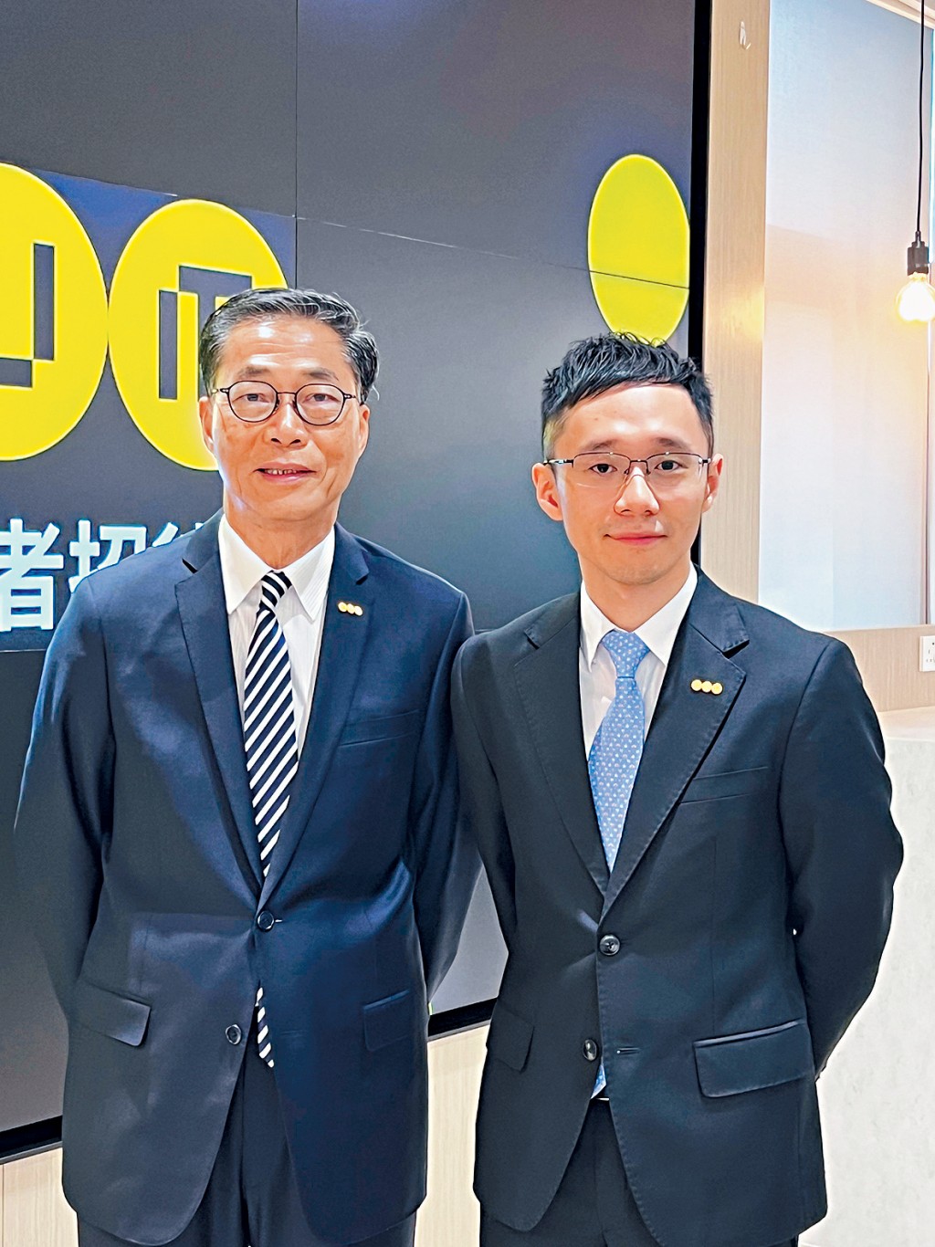 陳銳隆（左）預期，當其他受託人陸續加入積金易平台後，預期減費情況陸續出現。