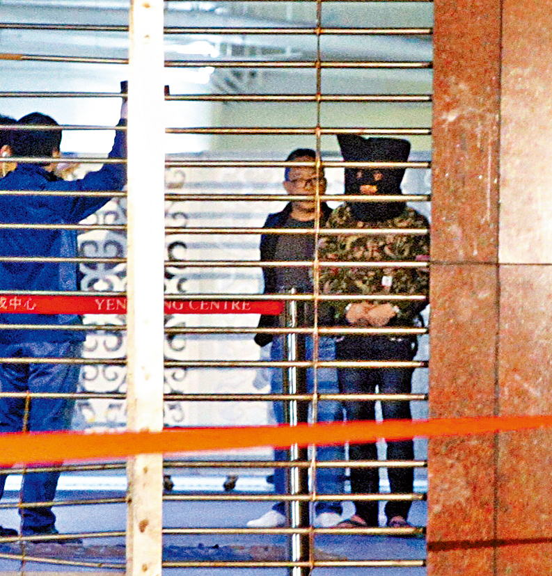 被告涉謀殺保安員被警方拘捕。