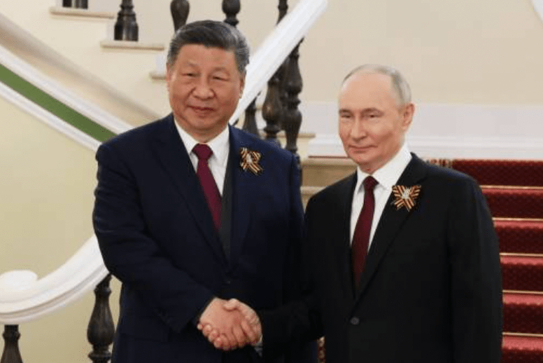 普京下周三將在北京出席大閱兵,屆時將獲安排坐在習近平的右側。法新社 普京下周三將在北京出席大閱兵,屆時將獲安排坐在習近平的右側。法新社