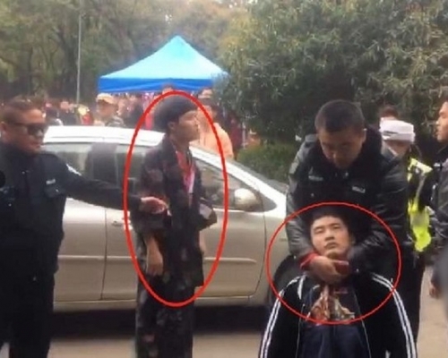 男子被指穿和服進武大賞櫻遭保安打,大喊:「我愛國,穿的是唐裝吳服。」(網圖)