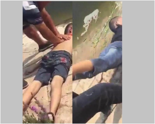 各人將兩名男童救上岸後進行急救。網圖