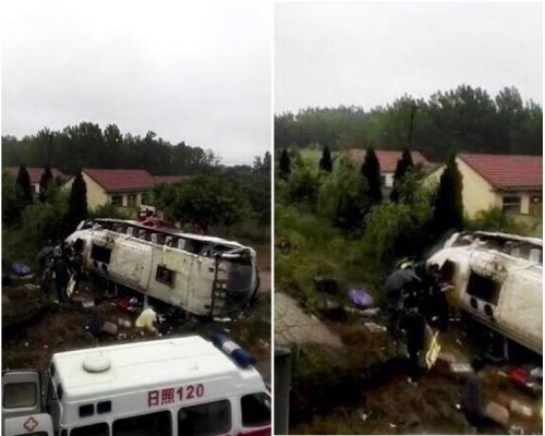 肇事大客车怀因雨天路滑翻侧。网图