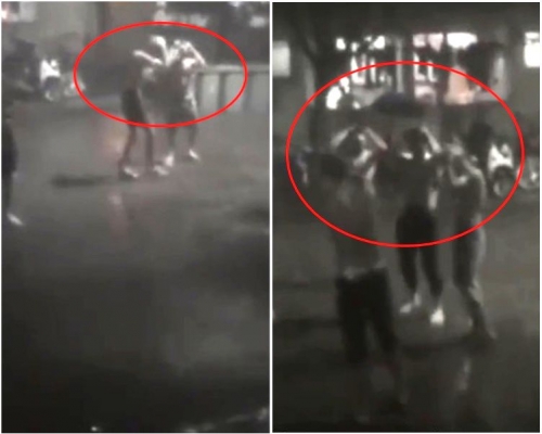 大批大學生在雨中沖涼洗澡。