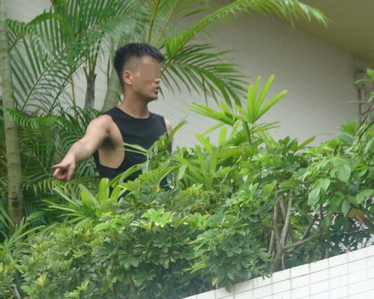 男子危企。林思明攝