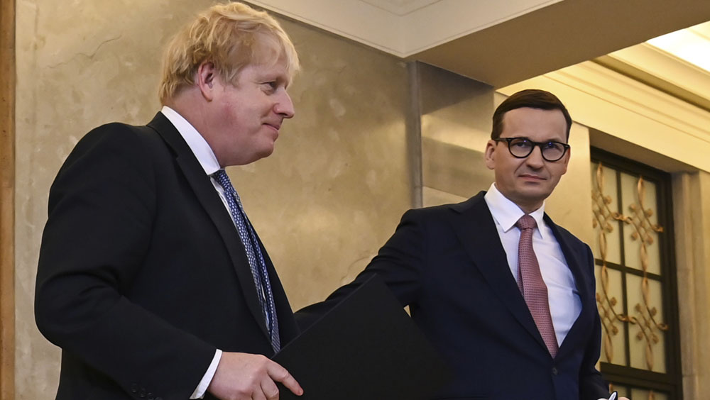 英國首相到訪波蘭,與波蘭總理莫拉維茨基會談,就俄烏緊張局勢進行磋商。AP圖