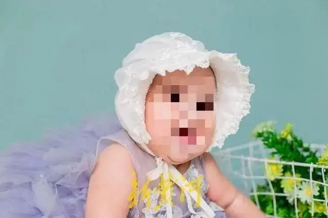 被虐待致死的3岁女童田田。