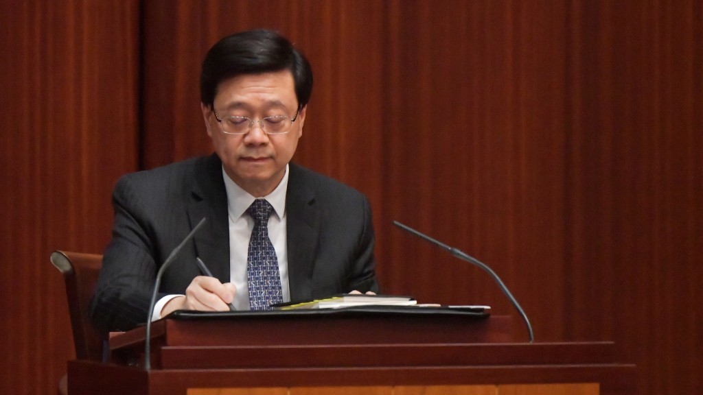 李家超出席首次互动交流答问会。陈极彰摄