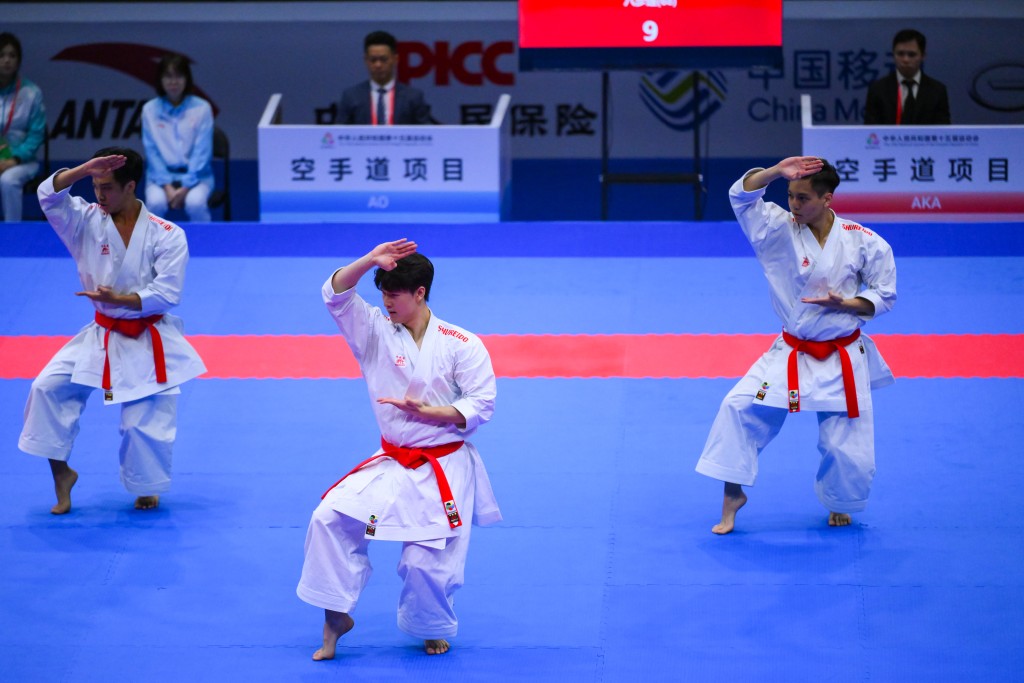 空手道群眾賽事活動，港隊招俊然、李智剛及鄧宇軒於男子業餘組團體型決賽摘銀。