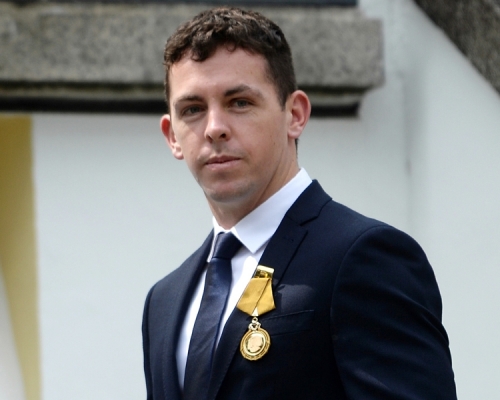 澳洲警員Zachary Brian Rolfe成為回歸以來首名非港人獲頒勳章。蘇正謙攝