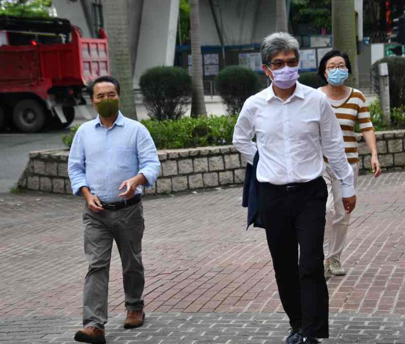 何俊仁（左）及單仲偕（右）。