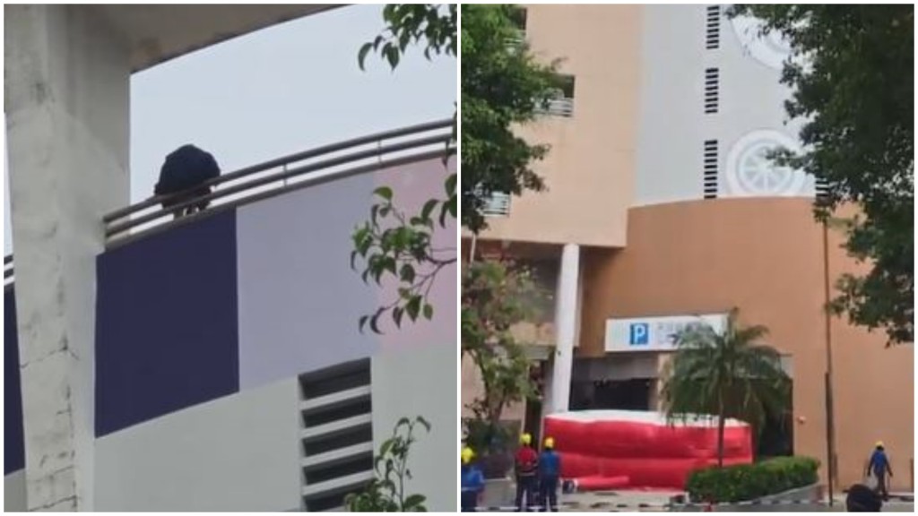 女生危坐商場天台欄杆。網上片段截圖