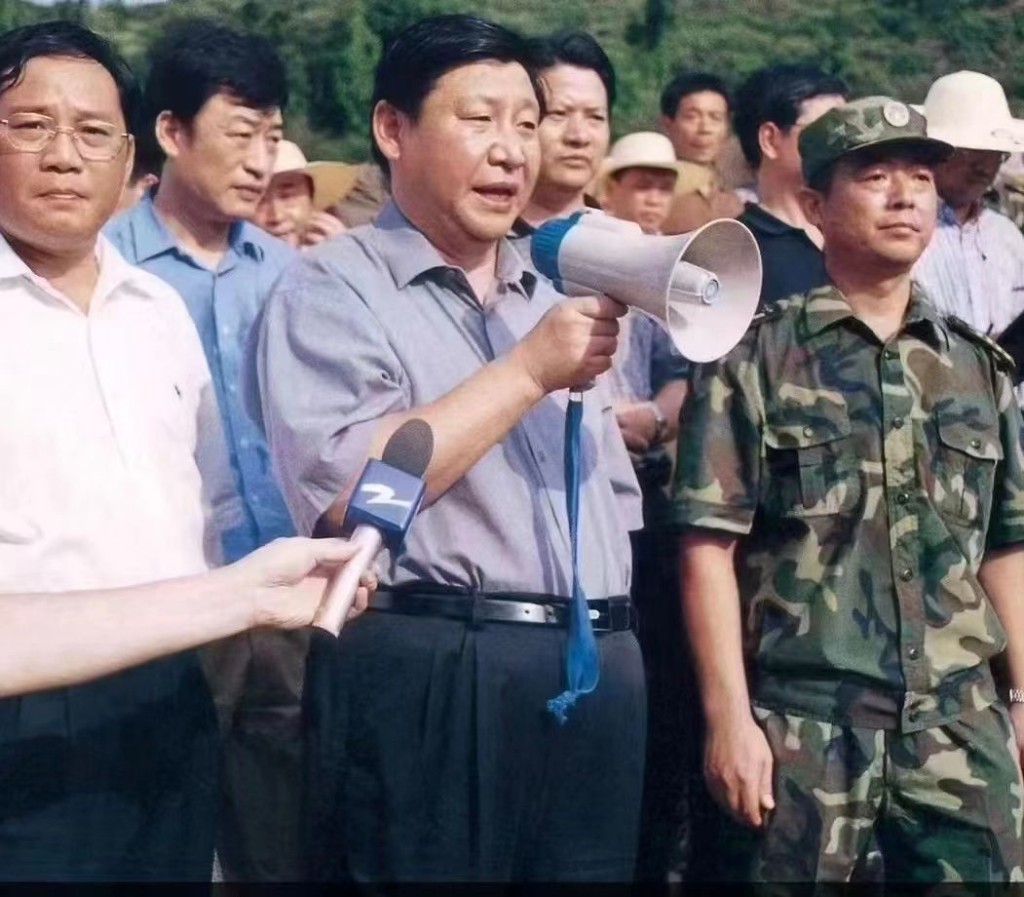 李强（左）曾任浙江省委书记习近平的大管家。