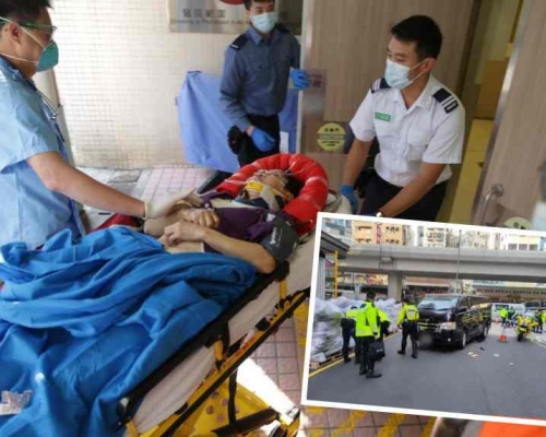老婦由救護車送院。梁國峰攝