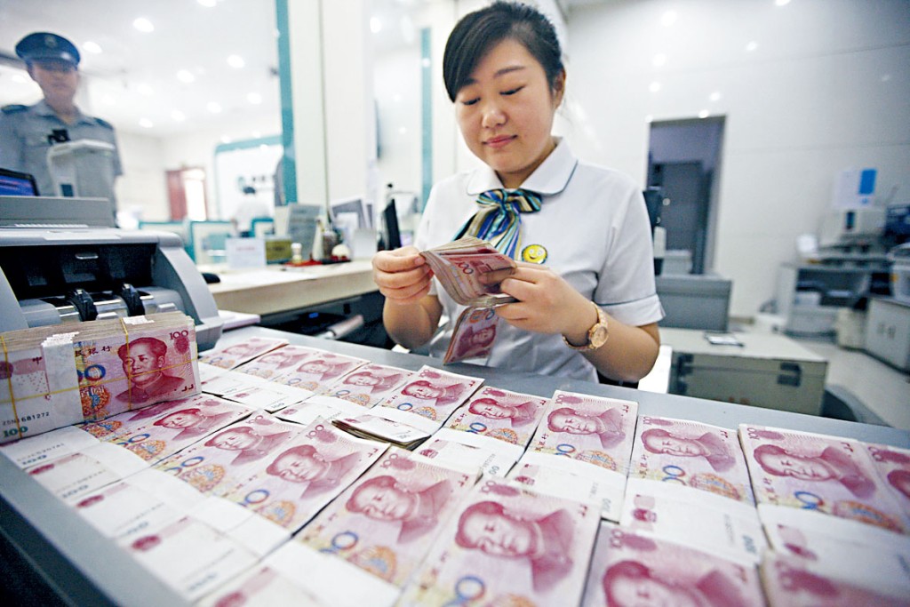 美元走強令人民幣受壓,昨曾跌穿6.5兌1美元。