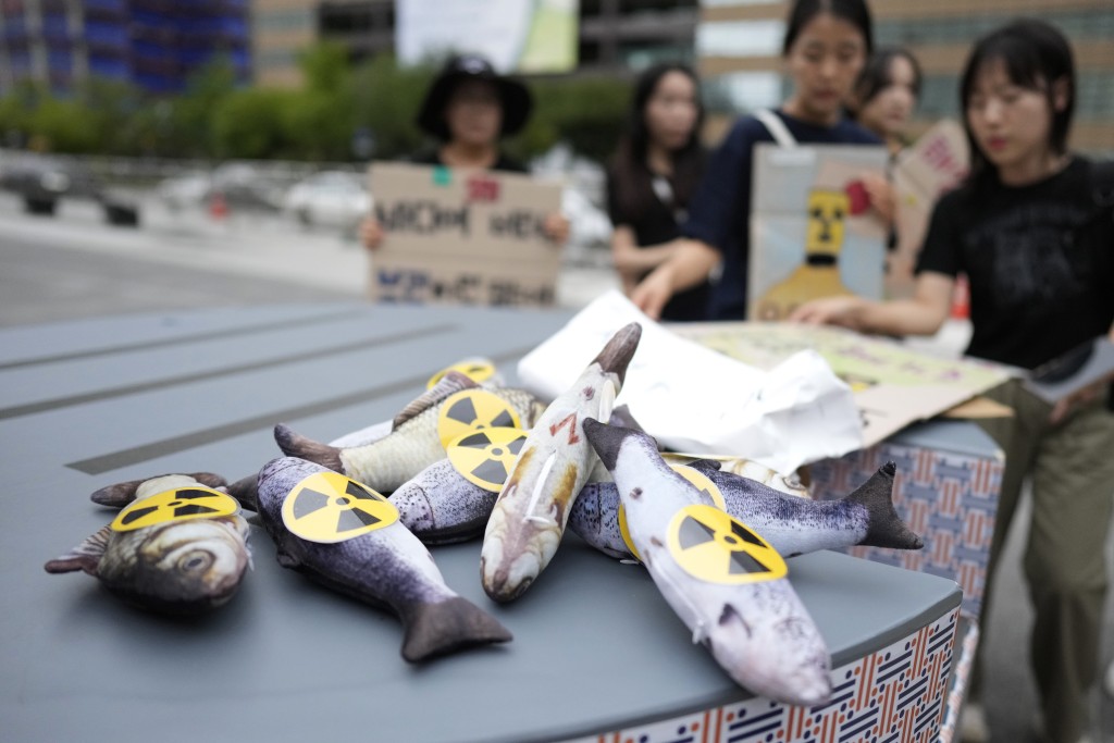 南韓民眾抗議日本排污入海。美聯社