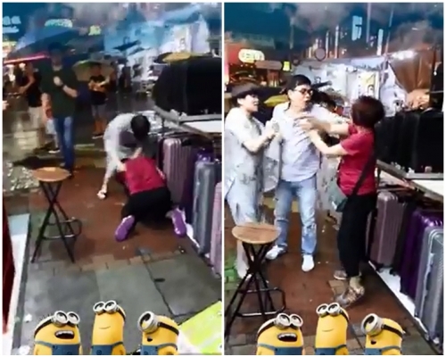 灰衣大媽用連環拳痛打紅衣大媽頭部達6次(左);一名男子上前分開2人(右)。