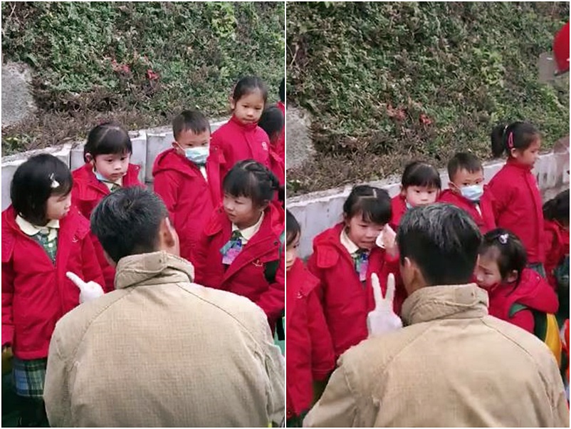 陳義良當日在車禍現場安撫受驚的幼稚園生。資料圖片