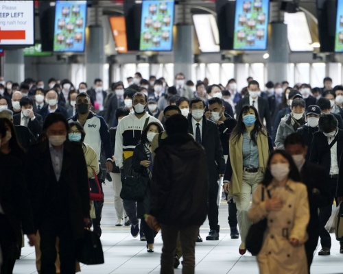 日本新冠肺炎疫情持續。AP