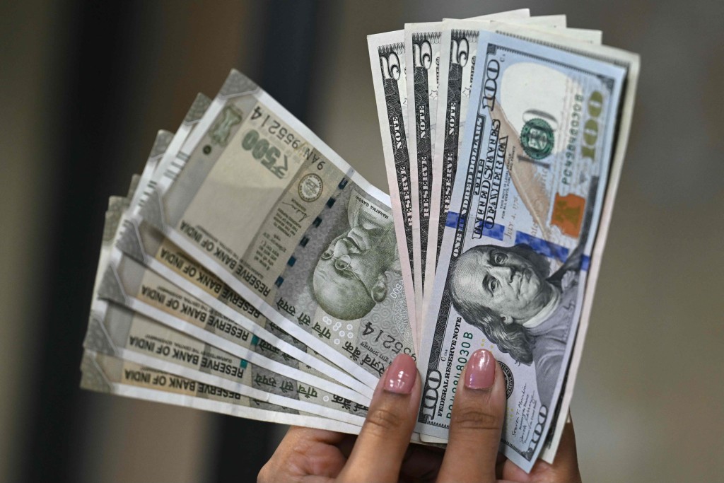 特朗普警告，若關稅政策被推翻，政府賠償或涉數萬億美元。法新社